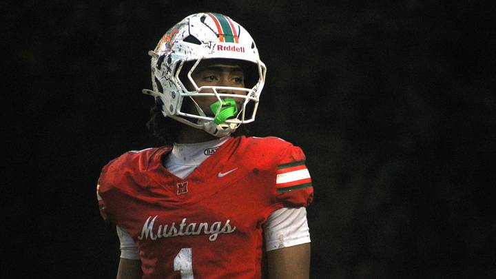 Mandarin receiver Brysen Wright (1) looks to the sideline for a signal during a high school football game against Fletcher on Oct. 10, 2025. [Clayton Freeman/Florida Times-Union]