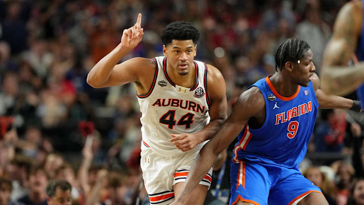 Apr 5, 2025; San Antonio, TX, USA; Auburn Tigers center Dylan Cardwell (44) reacts after a play against the Florida Gators during the second half in the semifinals of the men's Final Four of the 2025 NCAA Tournament at the Alamodome. Mandatory Credit: Bob Donnan-Imagn Images