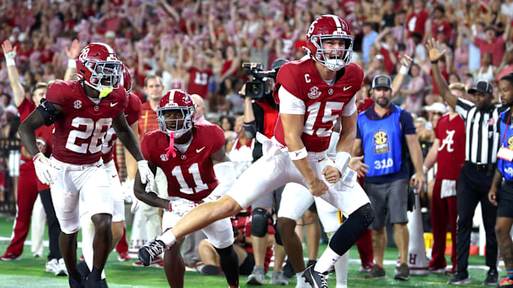 Alabama Crimson Tide quarterback Ty Simpson (15) celebrates a short-lived touchdown that was called back during the second quarter against the Louisiana Monroe Warhawks at Saban Field at Bryant-Denny Stadium.