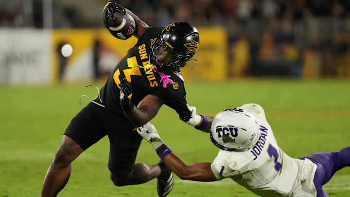 Sep 26, 2025; Tempe, Arizona, USA; Arizona State Sun Devils running back Raleek Brown (3) is tackled by TCU Horned Frogs safety Austin Jordan (1) in the second half at Mountain America Stadium, Home of the ASU Sun Devils. Mandatory Credit: Jacob Reiner-Imagn Images