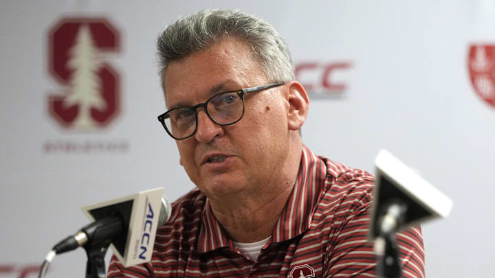 Feb 28, 2026; Stanford, California, USA; Stanford Cardinal head coach Kyle Smith talks to media members after defeating the Southern Methodist University Mustangs at Maples Pavilion. Mandatory Credit: Darren Yamashita-Imagn Images