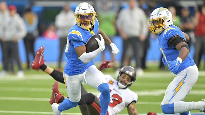 Los Angeles Chargers cornerback Tarheeb Still intercepts a pass intended for Tampa Bay Buccaneers wide receiver Mike Evans