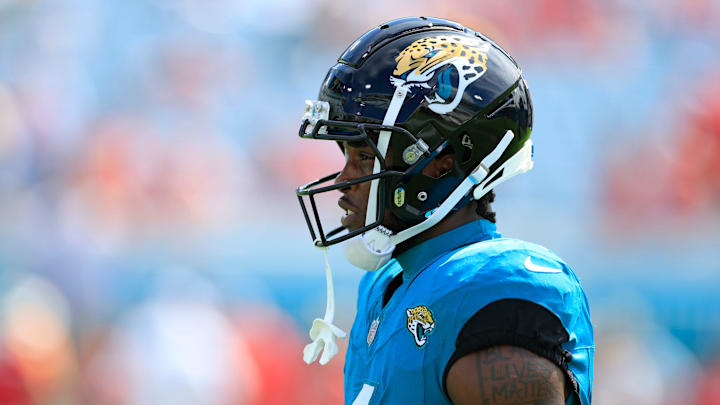 Jacksonville Jaguars running back Tank Bigsby (4) looks on before a NFL football game.