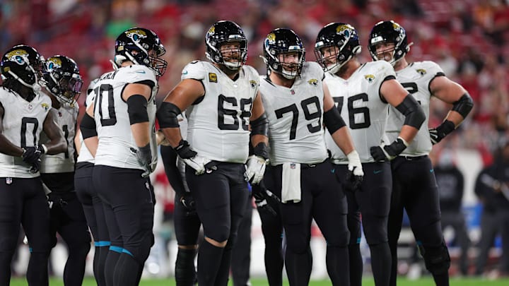 Dec 24, 2023; Tampa, Florida, USA;  Jacksonville Jaguars guard Brandon Scherff (68) and center Luke