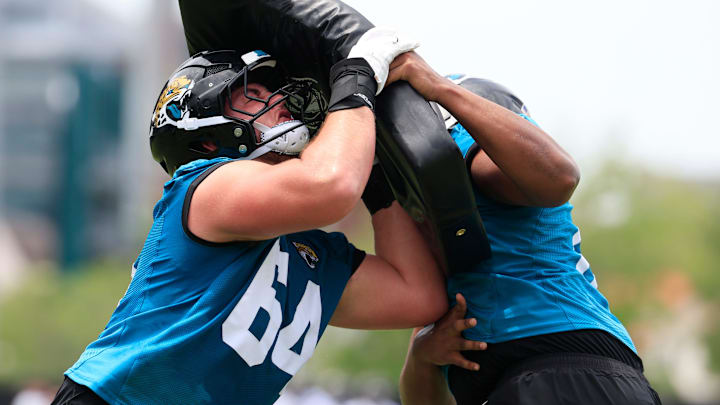 Jacksonville Jaguars guard Wyatt Milum (64) drills with guard Sal Wormley (61) during a rookie minicamp at Miller Electric Center Saturday, May 10, 2025 in Jacksonville, Fla. [Corey Perrine/Florida Times-Union]
