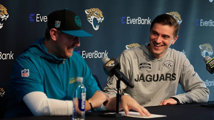 Jacksonville Jaguars general manager James Gladstone, right, smiles at head coach Liam Coen during a press conference at Miller Electric Center Tuesday, April 15, 2025 in Jacksonville, Fla. [Corey Perrine/Florida Times-Union]