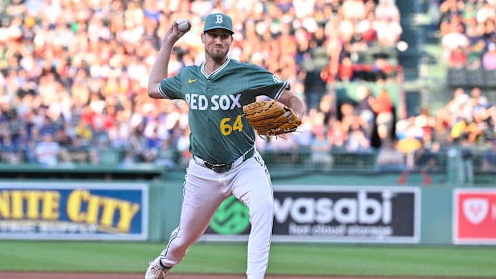 Aug 1, 2025; Boston, Massachusetts, USA; Boston Red Sox starting pitcher Cooper Criswell (64) pitches against the Houston Astros during the first inning at Fenway Park. Mandatory Credit: Eric Canha-Imagn Images