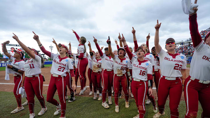 Oklahoma players celebrate after a Women's College World Series softball game between the Oklahoma Sooners (OU) and the Tennessee Volunteers at Devon Park in Oklahoma City, Thursday, May 29, 2025.