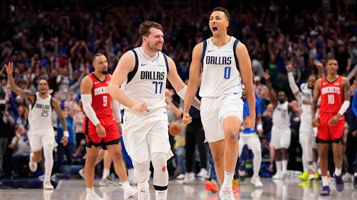 Dante Exum celebrates his buzzer-beating 3-pointer with teammate Luka Doncic