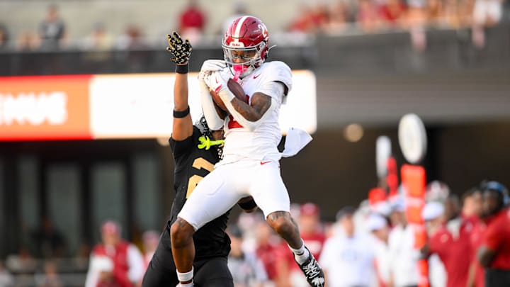 Oct 5, 2024; Nashville, Tennessee, USA;  Alabama Crimson Tide wide receiver Ryan Williams (2) makes a catch over Vanderbilt Commodores cornerback Jaylin Lackey (27) during the second half at FirstBank Stadium. Mandatory Credit: Steve Roberts-Imagn Images