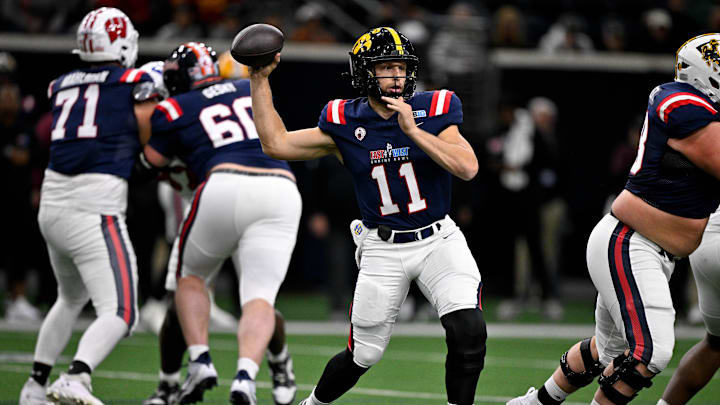 Jan 27, 2026; Frisco, TX, USA; West quarterback Mark Gronowski (11) drops back to pass against the East during the first half at the Ford Center at the Star. Mandatory Credit: Jerome Miron-Imagn Images
