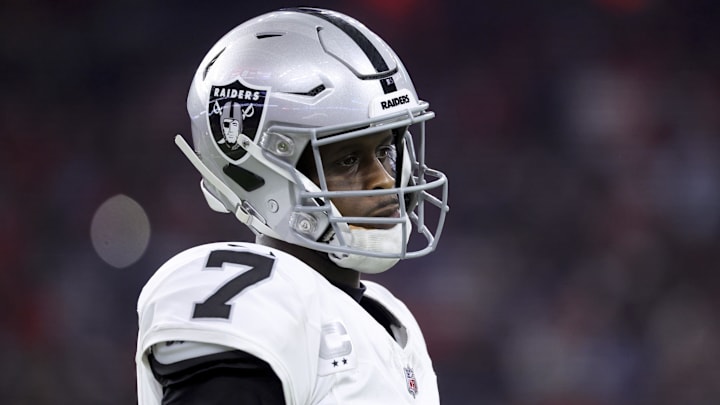 Dec 21, 2025; Houston, Texas, USA; Las Vegas Raiders quarterback Geno Smith (7) looks towards the sideline during the game against the Houston Texans at NRG Stadium. Mandatory Credit: Troy Taormina-Imagn Images