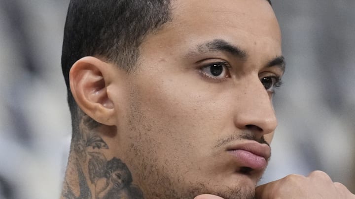 Apr 25, 2025; Milwaukee, Wisconsin, USA; Milwaukee Bucks forward Kyle Kuzma (18) sits on the bench as other players warm before game three of first round against the Indiana Pacers for the 2024 NBA Playoffs at Fiserv Forum. Mandatory Credit: Michael McLoone-Imagn Images Apr 25, 2025; Milwaukee, Wisconsin, USA; Milwaukee Bucks forward Kyle Kuzma (18) sits on the bench as other players warm before game three of first round against the Indiana Pacers for the 2024 NBA Playoffs at Fiserv Forum. Mandatory Credit: Michael McLoone-Imagn Images