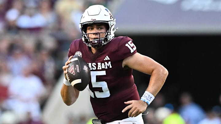Aug 31, 2024; College Station, Texas, USA; Texas A&M Aggies quarterback Conner Weigman (15) runs the ball during the first half against the Notre Dame Fighting Irish at Kyle Field. Mandatory Credit: Maria Lysaker-Imagn Images