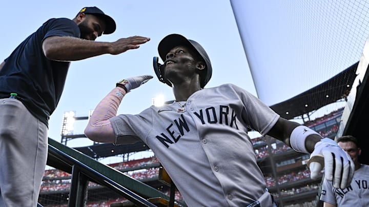 Aug 15, 2025; St. Louis, Missouri, USA; New York Yankees second baseman Jazz Chisholm Jr. (13) is congratulated by Amed Rosario (14) after hitting a two run home run against the St. Louis Cardinals during the first inning at Busch Stadium. Mandatory Credit: Jeff Curry-Imagn Images Aug 15, 2025; St. Louis, Missouri, USA; New York Yankees second baseman Jazz Chisholm Jr. (13) is congratulated by Amed Rosario (14) after hitting a two run home run against the St. Louis Cardinals during the first inning at Busch Stadium. Mandatory Credit: Jeff Curry-Imagn Images