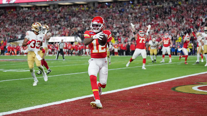 Feb 11, 2024; Paradise, Nevada, USA; Kansas City Chiefs wide receiver Mecole Hardman Jr. (12) scores a touchdown against the San Francisco 49ers in overtime during Super Bowl LVIII at Allegiant Stadium. Mandatory Credit: Kirby Lee-USA TODAY Sports