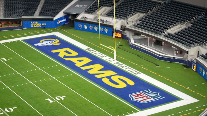 Nov 11, 2024; Inglewood, California, USA; The Los Angeles Rams and Salute to Service logos in the end zone at SoFi Stadium. Mandatory Credit: Kirby Lee-Imagn Images
