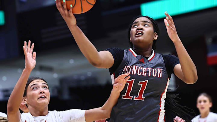Princeton's Erin Thomas (11) battles Wadsworth's Nathalie Maddox (3) for a rebound during the OHSAA DI state semifinals Thursday, March 12, 2026. Princeton's Erin Thomas (11) battles Wadsworth's Nathalie Maddox (3) for a rebound during the OHSAA DI state semifinals Thursday, March 12, 2026.