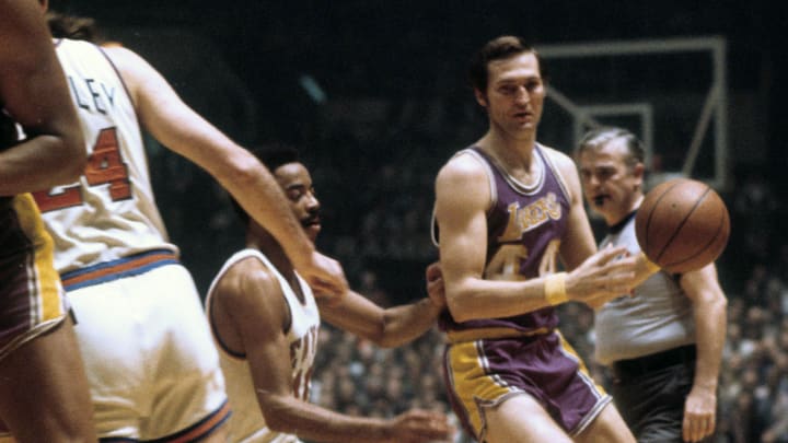 Jan 1, 1975; New York, NY, USA; FILE PHOTO; Los Angeles Lakers guard Jerry West (44) moves the ball as New York Knicks guard Walt Frazier (10) defends at Madison Square Garden. Mandatory Credit: Dick Raphael-USA TODAY Sports Jan 1, 1975; New York, NY, USA; FILE PHOTO; Los Angeles Lakers guard Jerry West (44) moves the ball as New York Knicks guard Walt Frazier (10) defends at Madison Square Garden. Mandatory Credit: Dick Raphael-USA TODAY Sports