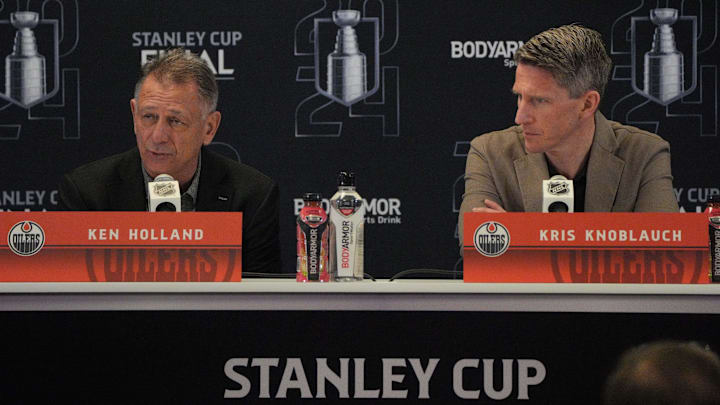 Jun 7, 2024; Sunrise, Florida, USA; Edmonton Oilers general manager Ken Holland, left, and head coach Kris Knoblauch take questions during media day in advance of the 2024 Stanley Cup Final at Amerant Bank Arena. Mandatory Credit: Jim Rassol-Imagn Images