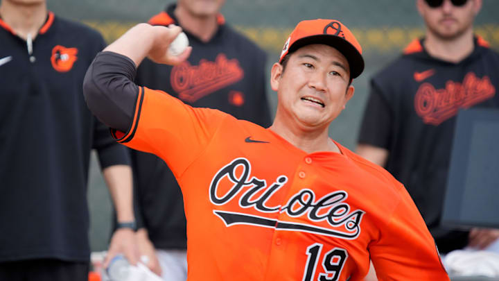 Orioles right-hand pitcher Tomoyuki Sugano throws a pitch during his session in the bullpen on Tuesday. The Baltimore Orioles held their first full-squad workout of the 2025 spring training season on Tuesday, Feb. 18th in Sarasota, Florida.