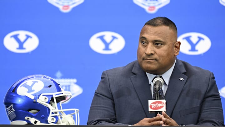 BYU's head coach, Kalani Sitake, sits for a press conference at the Big 12 media day