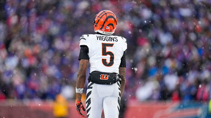Cincinnati Bengals wide receiver Tee Higgins (5) walks for the sideline after hitting his head for a second time in the fourth quarter of the NFL Week 14 game between the Buffalo Bills and the Cincinnati Bengals at Highmark Stadium in Orchard Park, N.Y., on Sunday, Dec. 7, 2025. The Bills overcame a halftime deficit to win 39-34. Cincinnati Bengals wide receiver Tee Higgins (5) walks for the sideline after hitting his head for a second time in the fourth quarter of the NFL Week 14 game between the Buffalo Bills and the Cincinnati Bengals at Highmark Stadium in Orchard Park, N.Y., on Sunday, Dec. 7, 2025. The Bills overcame a halftime deficit to win 39-34.