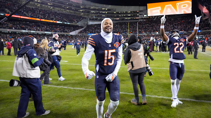 Rome Odunze (15) celebrates a Bears playoff win over Green Bay.