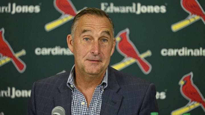 Aug 1, 2023; St. Louis, Missouri, USA; St. Louis Cardinals president of baseball operations John Mozeliak talks with the media after the Cardinals traded shortstop Paul DeJong (11) and starting pitcher Jack Flaherty (22) before a game against the Minnesota Twins at Busch Stadium. Mandatory Credit: Jeff Curry-Imagn Images Aug 1, 2023; St. Louis, Missouri, USA; St. Louis Cardinals president of baseball operations John Mozeliak talks with the media after the Cardinals traded shortstop Paul DeJong (11) and starting pitcher Jack Flaherty (22) before a game against the Minnesota Twins at Busch Stadium. Mandatory Credit: Jeff Curry-Imagn Images
