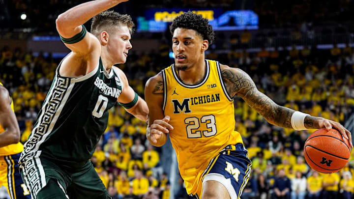 Michigan forward Yaxel Lendeborg dribbles against Michigan State forward Jaxon Kohler Michigan forward Yaxel Lendeborg dribbles against Michigan State forward Jaxon Kohler