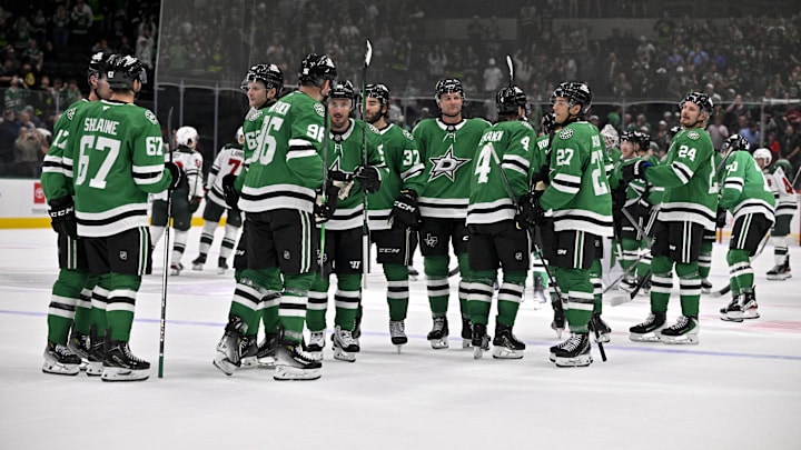 Sep 23, 2025; Dallas, Texas, USA; The Dallas Stars celebrate on the ice after defeating the Minnesota Wild at American Airlines Center. Mandatory Credit: Jerome Miron-Imagn Images
