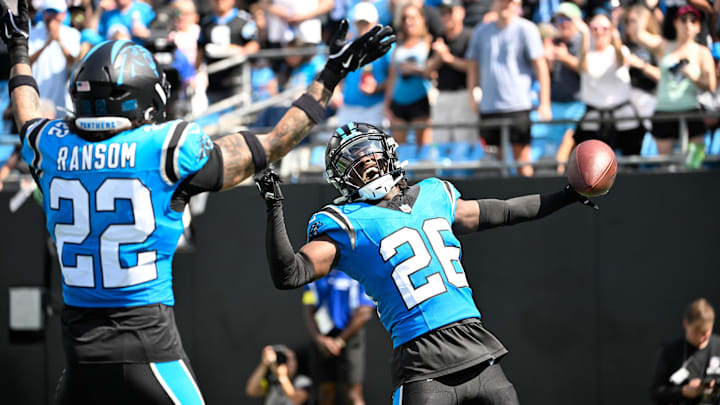 Sep 21, 2025; Charlotte, North Carolina, USA; Carolina Panthers cornerback Chau Smith-Wade (26) celebrates with safety Lathan Ransom (22) after intercepting the ball and scoring a touchdown in the third quarter at Bank of America Stadium. Mandatory Credit: Bob Donnan-Imagn Images Sep 21, 2025; Charlotte, North Carolina, USA; Carolina Panthers cornerback Chau Smith-Wade (26) celebrates with safety Lathan Ransom (22) after intercepting the ball and scoring a touchdown in the third quarter at Bank of America Stadium. Mandatory Credit: Bob Donnan-Imagn Images