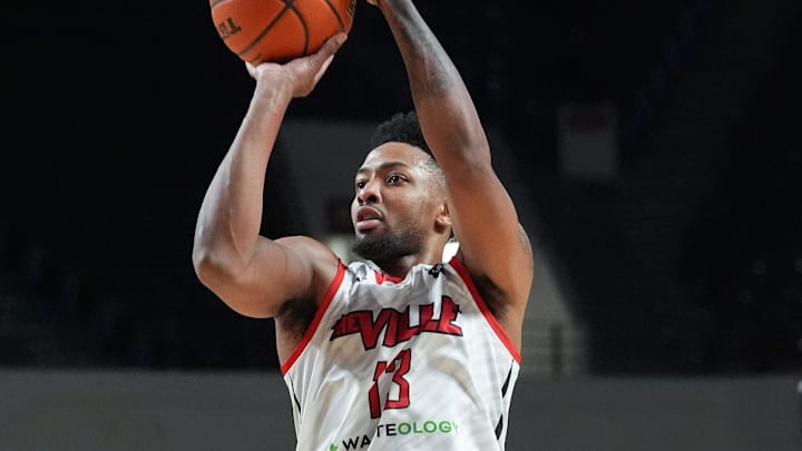 The Ville's David Johnson (13) launched a 3-point shot against DRC during the TBT Regional Championship at Freedom Hall in Louisville, Ky. on July 24, 2024. The Ville's David Johnson (13) launched a 3-point shot against DRC during the TBT Regional Championship at Freedom Hall in Louisville, Ky. on July 24, 2024.