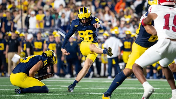 Michigan kicker Dominic Zvada attempts a field goal in the Wolverines' season-opener against Fresno State at Michigan Stadium in Ann Arbor, Mich.