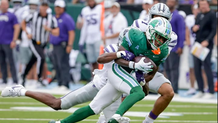Tulane wide receiver Mario Williams (4) makes a long pass reception against Kansas State during the second half of an NCAA football game at Yulman Stadium in New Orleans, Saturday, Sept. 7, 2024.