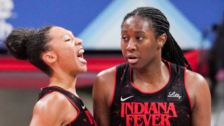 Indiana Fever guard Aerial Powers (23) celebrates Indiana Fever forward Aliyah Boston (7) on Tuesday, Sept. 16, 2025, during Game 2 of a WNBA playoff matchup between the Indiana Fever and the Atlanta Dream at Gainbridge Fieldhouse in Indianapolis. The Indiana Fever defeated the Atlanta Dream, 77-60.