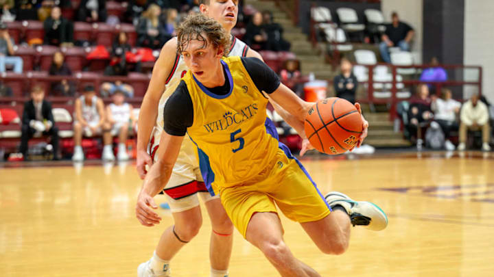 Brookeland's Cade Morgan dribbles against Tyler Chapel Hill in the Tenaha ISD Holiday Hoops on Dec. 28. Photo by Wayne Grubbs