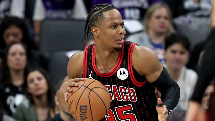Mar 8, 2026; Sacramento, California, USA; Chicago Bulls guard Isaac Okoro (35) controls the ball against the Sacramento Kings during the second quarter at Golden 1 Center. Mandatory Credit: Dennis Lee-Imagn Images
