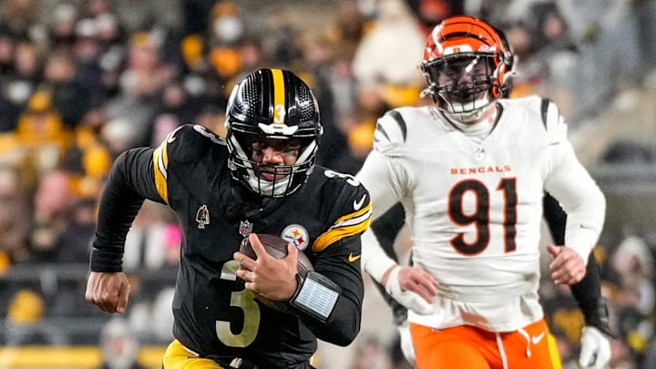 Pittsburgh Steelers quarterback Russell Wilson (3) runs for a first down in the fourth quarter of the NFL Week 18 game between the Pittsburgh Steelers and the Cincinnati Bengals at Acrisure Stadium in Pittsburgh on Saturday, Jan. 4, 2025. The Bengals won 19-17 to finish the regular season at 9-8.