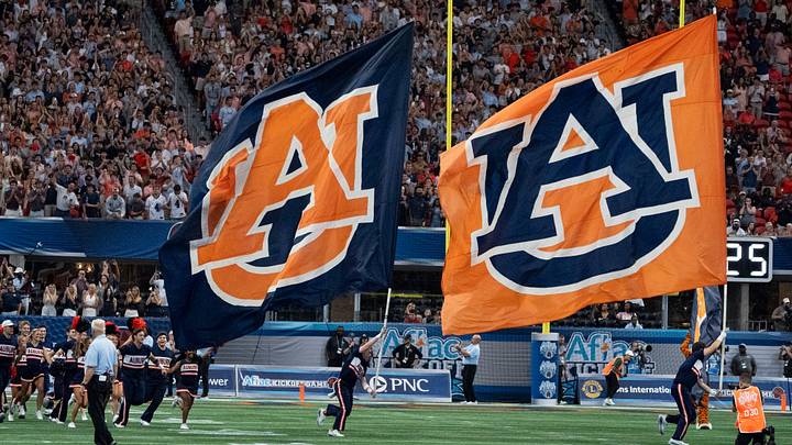 Auburn Tigers Cheerleaders lead out the team as Auburn Tigers take on Baylor Bears in the Aflac Kickoff Game at Mercedes-Benz Stadium in Atlanta, Ga. on Saturday, Sept. 5, 2026. Auburn Tigers defeated Baylor Bears 17-16. Auburn Tigers Cheerleaders lead out the team as Auburn Tigers take on Baylor Bears in the Aflac Kickoff Game at Mercedes-Benz Stadium in Atlanta, Ga. on Saturday, Sept. 5, 2026. Auburn Tigers defeated Baylor Bears 17-16.