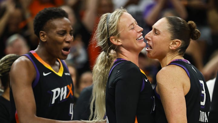 Phoenix Mercury guard Sophie Cunningham (9) celebrates with Phoenix Mercury forward Natasha Mack (4) and Phoenix Mercury guard Diana Taurasi (3) after hitting an and-one on a lay up on Aug. 18, 2024 at Footprint Center in Phoenix.