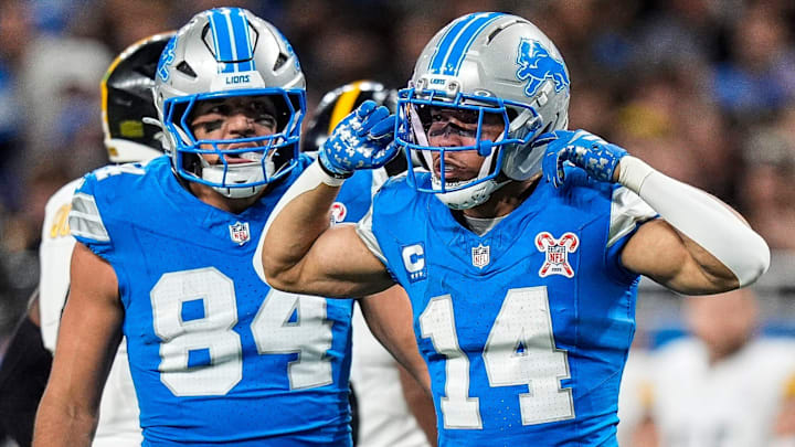 Detroit Lions wide receiver Amon-Ra St. Brown (14) celebrates a first down against Pittsburgh Steelers during the first half at Ford Field in Detroit on Sunday, Dec. 21, 2025.