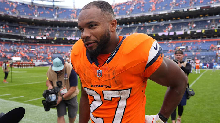 Sep 7, 2025; Denver, Colorado, USA; Denver Broncos running back J.K. Dobbins (27) after the game at Empower Field at Mile High. 