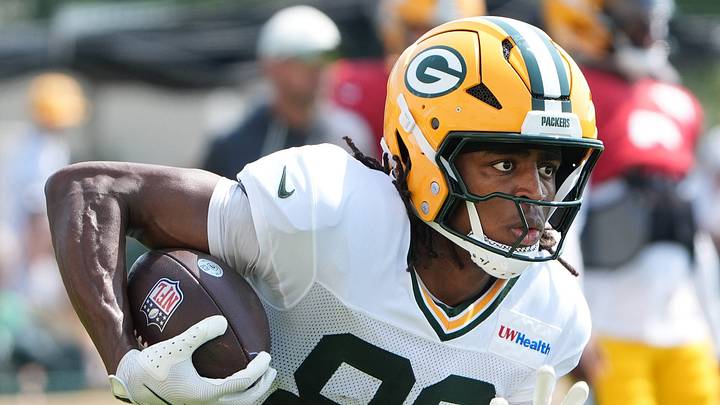 Green Bay Packers receiver Isaiah Neyor turns upfield after catching pass at training camp. Green Bay Packers receiver Isaiah Neyor turns upfield after catching pass at training camp.