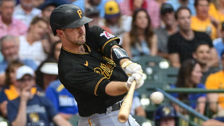 Aug 5, 2023; Milwaukee, Wisconsin, USA; Pittsburgh Pirates catcher Jason Delay (55) hits a two RBI double against the Milwaukee Brewers in the fifth inning at American Family Field. Mandatory Credit: Benny Sieu-Imagn Images