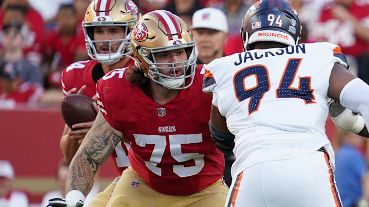 Aug 9, 2025; Santa Clara, California, USA; San Francisco 49ers offensive lineman Connor Colby (75) pass protects San Francisco 49ers quarterback Tanner Mordecai (4) against Denver Broncos defensive lineman Jordan Jackson (94) in the second quarter at Levi's Stadium. Mandatory Credit: David Gonzales-Imagn Images Aug 9, 2025; Santa Clara, California, USA; San Francisco 49ers offensive lineman Connor Colby (75) pass protects San Francisco 49ers quarterback Tanner Mordecai (4) against Denver Broncos defensive lineman Jordan Jackson (94) in the second quarter at Levi's Stadium. Mandatory Credit: David Gonzales-Imagn Images