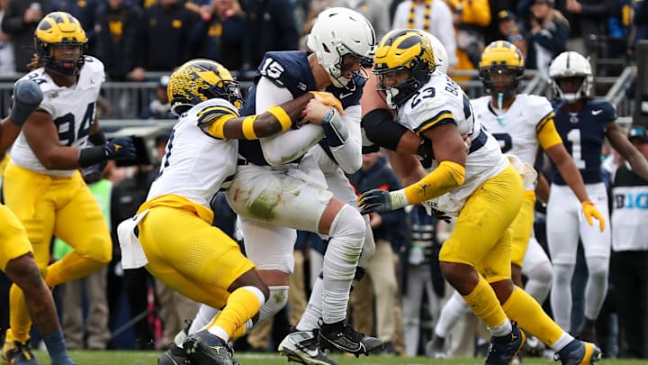 Penn State Nittany Lions quarterback Drew Allar (15) runs the ball against the Michigan Wolverines