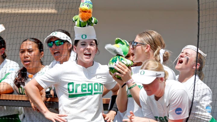 Oregon platers hold rally Ducks during the NCAA Norman Regional tournament softball final between the Oklahoma Sooners and the Oregon Ducks at Love's Field in Norman, Okla. Sunday, May 19, 2024.