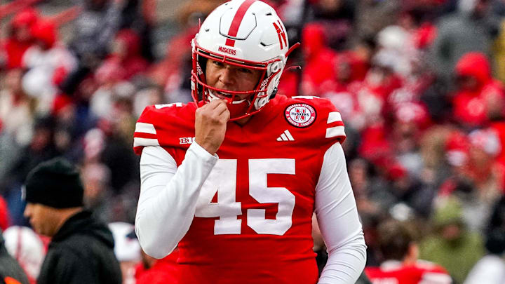 Oct 28, 2023; Lincoln, Nebraska, USA; Nebraska Cornhuskers long snapper Marco Ortiz (45) warms up on