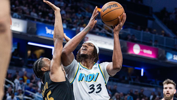 Apr 10, 2025; Indianapolis, Indiana, USA; Indiana Pacers center Myles Turner (33) shoots the ball while Cleveland Cavaliers forward Isaac Okoro (35) defends in the second half at Gainbridge Fieldhouse. Mandatory Credit: Trevor Ruszkowski-Imagn Images Apr 10, 2025; Indianapolis, Indiana, USA; Indiana Pacers center Myles Turner (33) shoots the ball while Cleveland Cavaliers forward Isaac Okoro (35) defends in the second half at Gainbridge Fieldhouse. Mandatory Credit: Trevor Ruszkowski-Imagn Images
